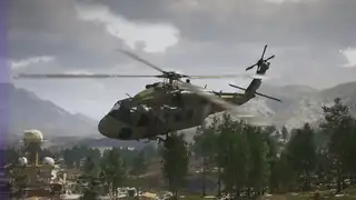 A military helicopter flying low over pine trees in Dead Fibers